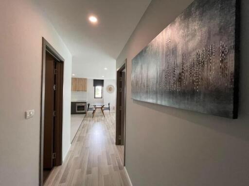 Hallway leading to the kitchen and living area