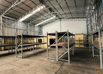 Spacious warehouse with metal shelves