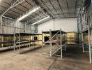 Spacious warehouse with metal shelves