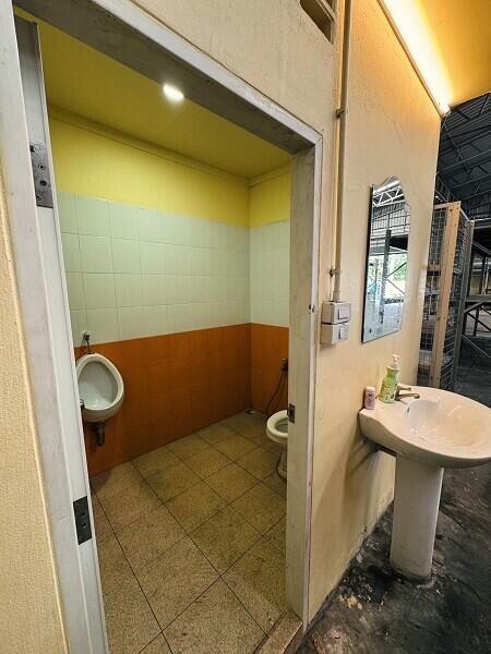 Bathroom with urinal and toilet