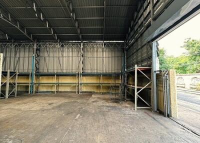 Empty warehouse with shelving