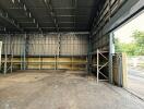 Empty warehouse with shelving