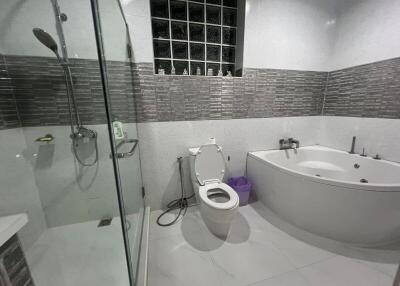 Modern bathroom with shower and bathtub