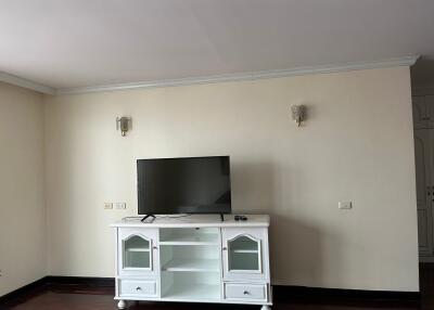 Living room with TV and cabinet