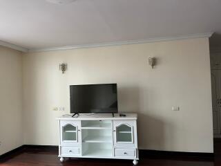 Living room with TV and cabinet