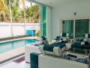 Modern living room with pool view