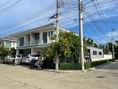 Two-story house with garden and parking space