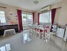 Modern dining room with piano and large windows