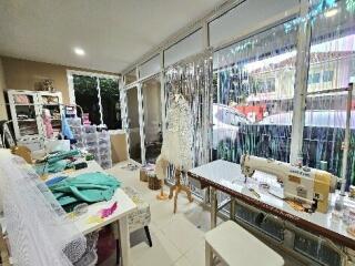 Workroom with sewing machines and craft materials