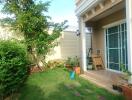 Outdoor garden area with entrance to house