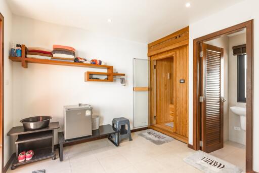 Modern bathroom with wooden elements and sauna