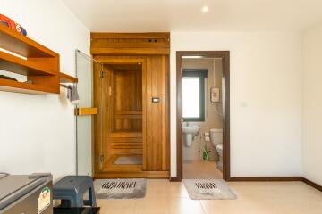 Modern bathroom with a wooden sauna