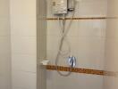 Bathroom shower area with water heater