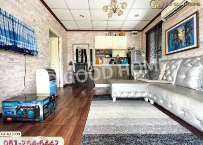 Spacious living room with hardwood floors and modern decor