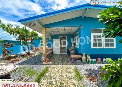 Front view of a house with a garden