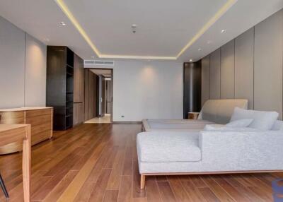 Modern living room with wooden flooring and comfortable seating