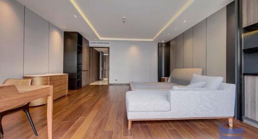 Modern living room with wooden flooring and comfortable seating