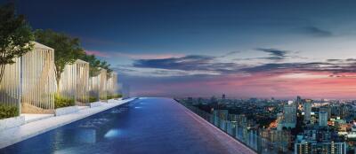 Stunning rooftop infinity pool overlooking city skyline at sunset