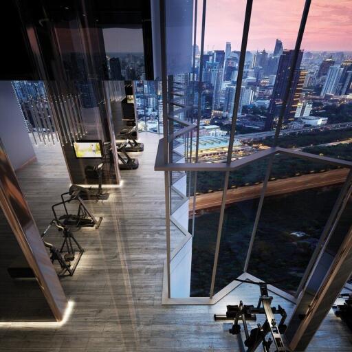 Modern high-rise gym with city view