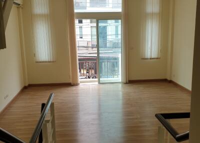 Bright and spacious living room with large windows