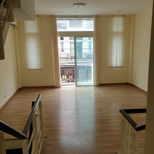 Bright and spacious living room with large windows