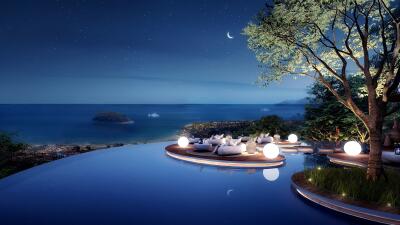 Beautiful night view at outdoor pool area overlooking ocean