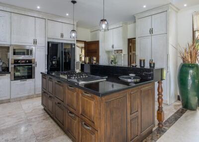 Modern kitchen with island counter and appliances