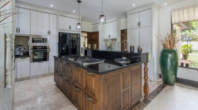 Modern kitchen with island counter and appliances