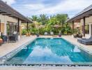 Outdoor pool with patio furniture and greenery