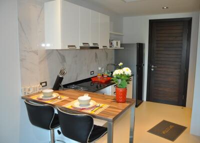 Modern kitchen with breakfast bar in a property