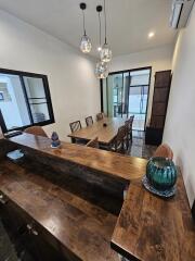 Modern dining room with wooden table and chairs