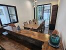 Modern dining room with wooden table and chairs