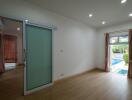 Bedroom with sliding door and view to pool