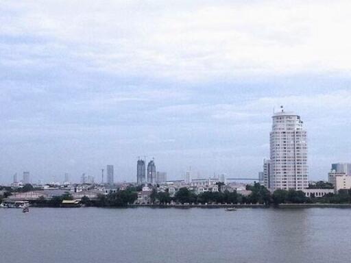 Riverside view with high-rise buildings