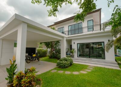 Modern house exterior with garden