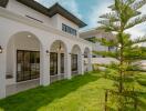 Spacious backyard with patio and large windows