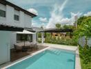 Outdoor area with a swimming pool and seating area