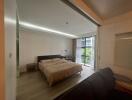 Modern bedroom with large window and sliding partition