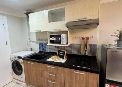 Modern kitchen with appliances and cabinetry