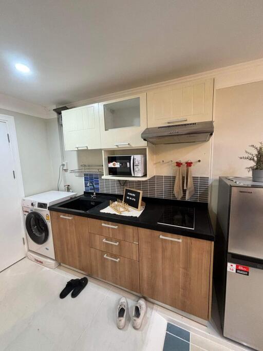 Modern kitchen with appliances and cabinetry