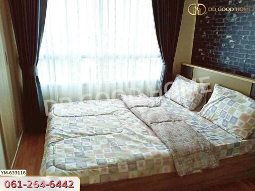 cozy bedroom with double bed and large window