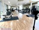 Spacious and well-equipped gym with various exercise machines and equipment