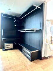 Spacious built-in closet with shelves and drawers