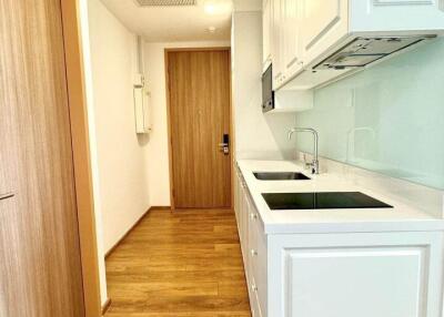 Modern kitchen with wooden flooring