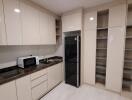 Modern kitchen with ample storage and appliances