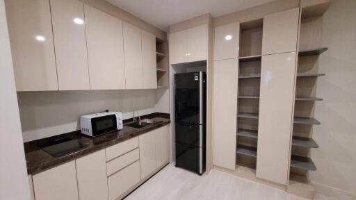 Modern kitchen with ample storage and appliances