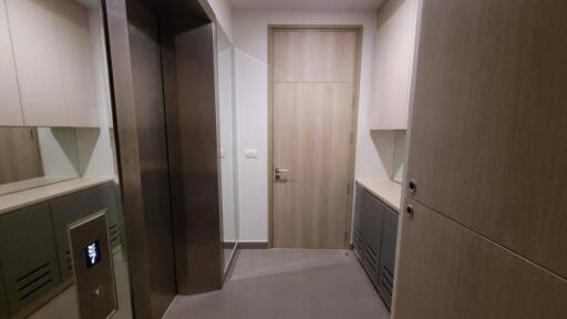 Elevator lobby with storage cabinets