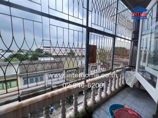 Balcony view with surrounding buildings