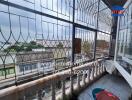 Balcony view with surrounding buildings