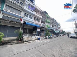 Street view of a building with multiple units and visible contact information for Inter Real Estate